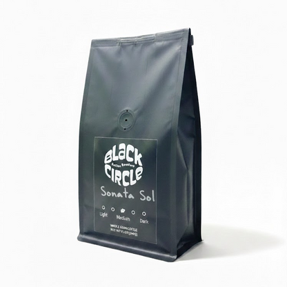 Black coffee bag with 'Black Circle' branding on a white background
